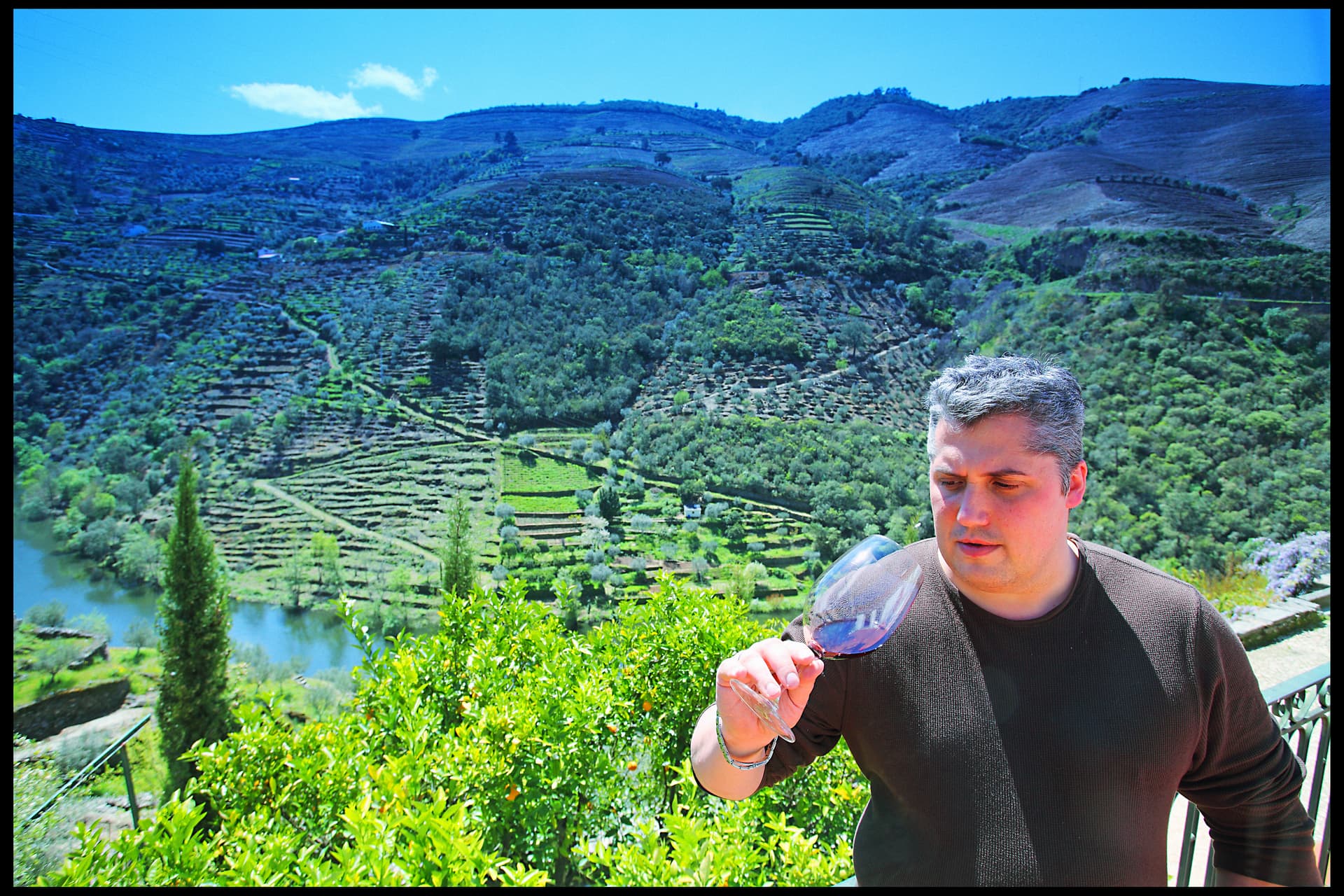 Mark DeWolf visiting a vineyard in the Douro Valley